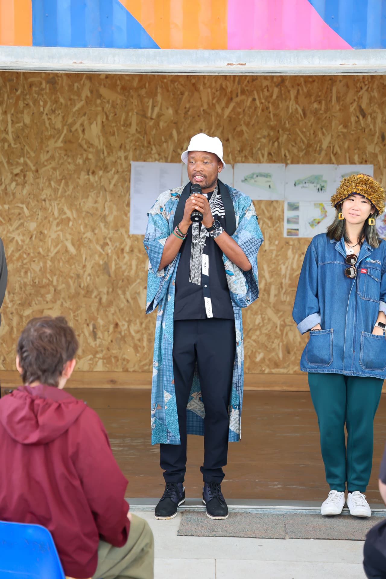 Community speaker addressing guests at the event
