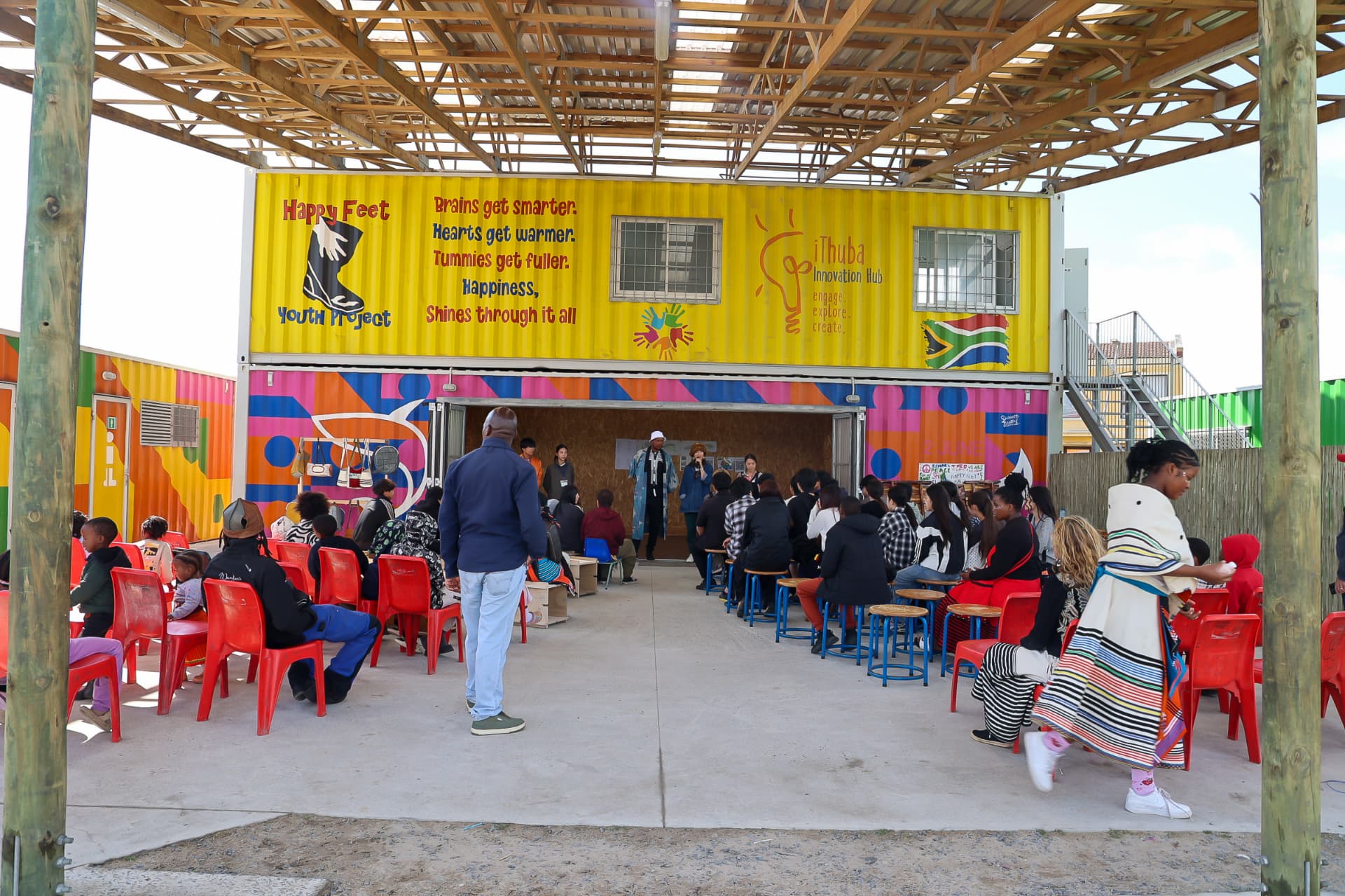 Community members gathered at Happy Feet Youth Project and Ithuba Innovation Hub